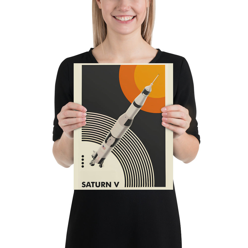 Woman holding the Saturn V vintage poster