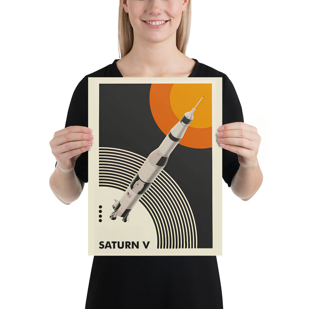 Woman holding the Saturn V vintage poster